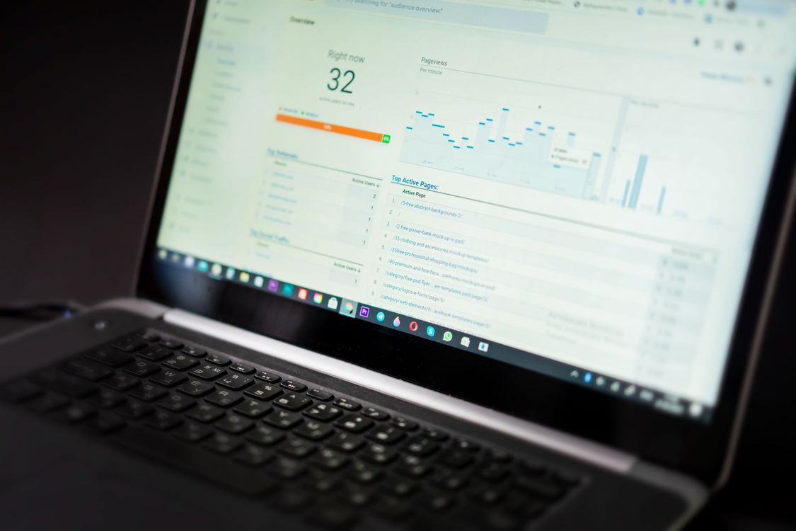 Laptop displaying analytics dashboard for SEO performance tracking